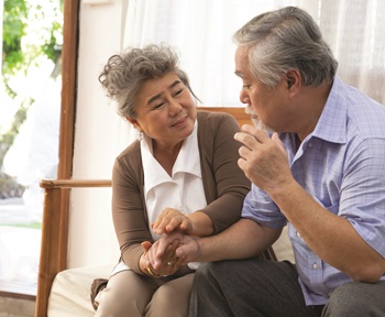 couple talking on couch